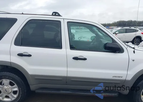 2001 Ford Escape Xlt z USA, uszkodzony, nr VIN 1FMYU03181KC55279